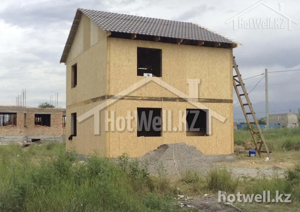 Дом «А-100В» 100 м² под крышей — этап перед фасадной отделкой и окнами